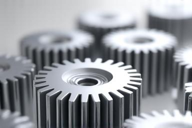 Interlocking gears representing a smooth process.