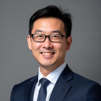 Professional headshot of David Chen.